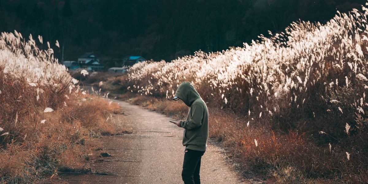 A person in a thoughtful pose, symbolizing a career or creative journey and its evolution.