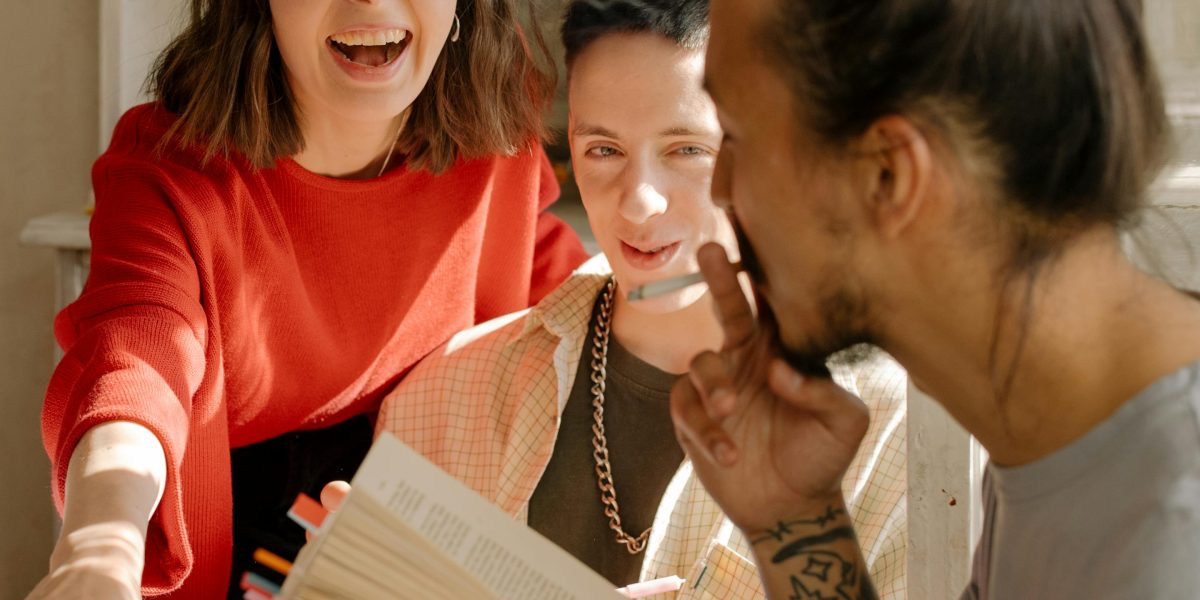 Sharing a moment of genuine laughter reflecting life's humorous complexities.